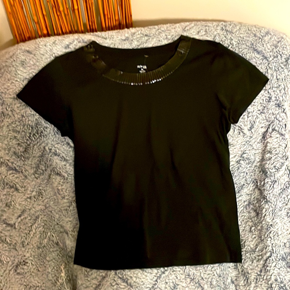 style and co black tee, with sequins detail around the neck